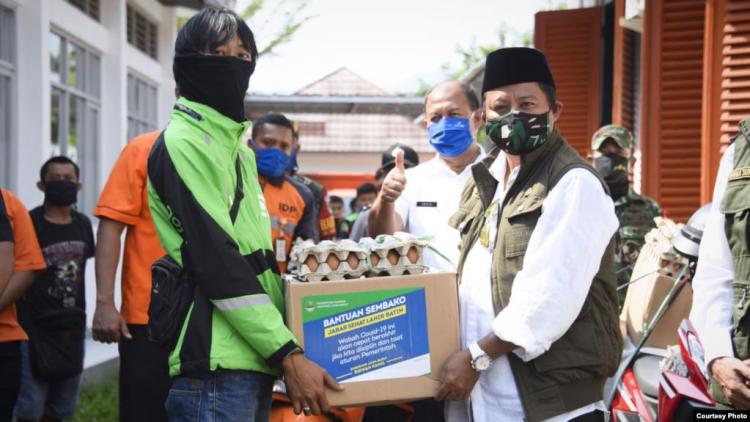 PBJ COVID-19 (foto: voaindonesia.com) PBJ COVID-19 (foto: voaindonesia.com)